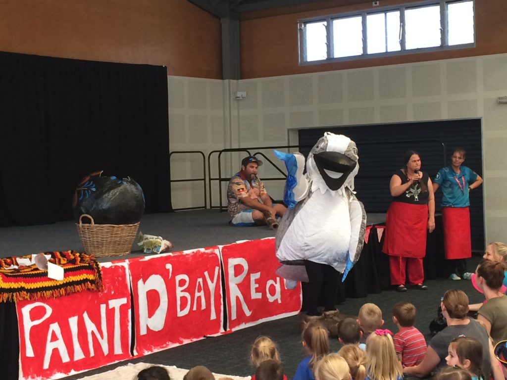 Kookaburra mascot with seated children at launch